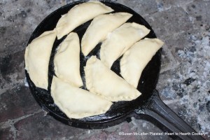 The receipt (recipe) "To make Pasties to Fry" are on the griddle.  The boiled apples and currants were mixed with sugar, rosewater, cinnamon, carraway-seeds and candied orange peel.
