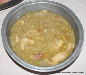 After the onions have been boiled with butter, pepper, salt and a sliced French Roule for the receipt (recipe), "To make an Onion Soup", then dish it up and put to it a large spoonful of vinegar.