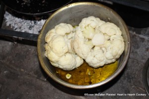 To complete the receipt (recipe), "Cauliflowers dressed the Spanish Way", to a large cauliflower put a pint of sweet oil, two or three cloves garlic, then season them with pepper and salt, and let them simmer over a very slow fire an hour.