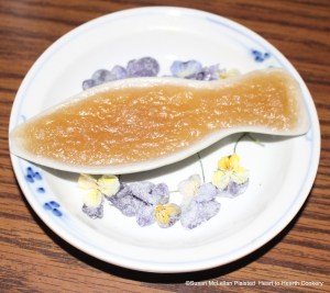 The receipt (recipe) "Past of Oringes: My Lady Howe's Receipt, reads "then put it in cleere-cake glasses. I have many pieces of reproduction hand-blown glass but not a "cleere-cake glass" I put the mixture of apple pulp, sugar, stamped Seville orange peel and juice in my stoneware fish molds.