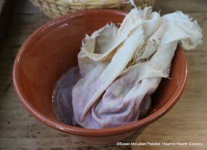 The first step in the 1796 receipt (recipe) "For preserving Strawberries" is to take two quarts of Strawberries and squeeze them through a cloth.  I prepared half the receipt and started with one quart of strawberries for squeezing.