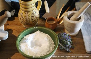 The sugar, steeped gum-dragon and burage flowers are ready to be made into a paste.