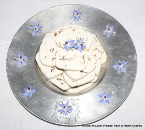The receipt (recipe) "Past of Burage: Mrs Whiteheads" presented for table.  The individual pastes remind me of slabs of marble stacked and they are garnished with fresh borage flowers.
