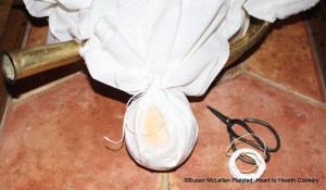 After the Seville oranges have laid in the spring water for twenty-four hours for the receipt (recipe) "To Preserve Oranges Whole" tie them in cloths.