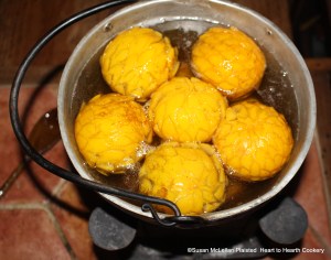 After a syrup is made with six pounds of sugar and water for the receipt (receipt) "To preserve Oranges Whole" take them out of the cloths, put them into the syrup and let them have a boil.