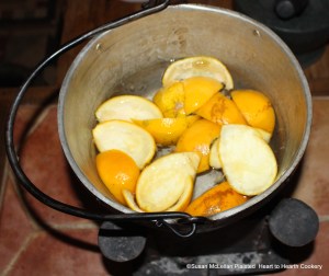 After the peels of three Seville oranges have been prepared for the receipt (recipe) "To make Orange Cheese Cakes" boil the peels 'till tender.