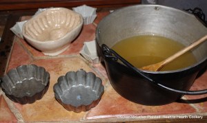 After the mixture of the Seville orange juice infused with the grated rinds of China oranges, lemons and Seville oranges and dissolved isinglass has cooked for the receipt (recipe) "To make Orange Jelly", the moulds were selected.