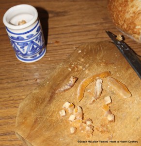 The preserved lemon peel is cut or shred small for the receipt (recipe) "To butter Eggs in the Polonian Fashion".