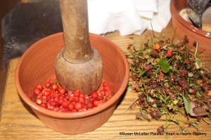 After the strawberries (Fragaria virginiana) were washed in a colander, the hulls were removed and the berries mashed for the receipt (recipe) To make a tarte of strawberyes.