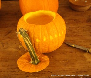 After all the seeds and half the flesh have been removed from a pumpkin for the receipt (recipe) Pompkin Soop, scar the outside in what Design you please.  I chose a simple diamond design between the ribs of the pumpkin and removed the rind with my knife.