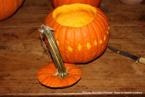 After designs have been scarred on the outside of the pumpkin for the receipt (recipe) Pompkin Soop garnish the scars with froughted whites of Eggs and Sugar then put it in a slack bake oven until it is of good Colour.  I used my birch twig whisk to froth the egg whites, added sugar and painted my scars with the mixture then baked the decorated pumpkin in a lukewarm (slack) oven.