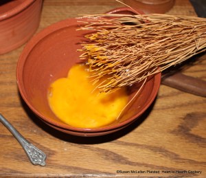After a Bit of Butter has been boiled in a Pint of Milk for the receipt (recipe), Pompkin Soop, get ready six Yolks of Eggs.  A birch twig whisk was used to prepare the egg yolks.