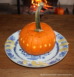 The pumpkin soup tureen scarred on the outside with a design contains a dried crust of bread in the bottom and the receipt (recipe) Pompkin Soop is poured in and covered as to appear whole.  The serving dish is garnished with apples that were stewed in a pumpkin at the hearth.