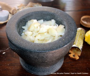 After some lemon peel has been grated on the sugar for the receipt (recipe) To make Biscuits of Potatoes then beat the Potatoes and Sugar together, in a Stone Mortar with some Butter.