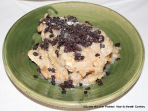 After the butter, sugar and boiled currants have been added to the baked minced onions and sliced apples for the receipt (recipe) To Butter Onions Otherways scrape on sugar.  The verb scrape is used as the sugar was literally scraped off a hard loaf of white sugar.