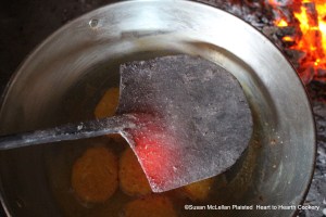 After the Cheshire cheese, butter and eggs mixed have been made into cakes and laid in a dish over coals for the receipt (recipe) To make Ramakins hold a salamander over them 'till they be brown.