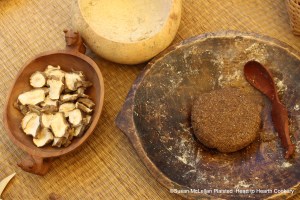 After the sunchoke flour has been mixed with flour and kneaded very well for the receipt (recipe) Sunchoke Bread as described by European observers of the Lenape, the bread is formed.  Pictured from left to right, sliced spring sunchokes dried, a gourd of sunchoke flour prepared by pounding the dried sunchokes, and the sunchoke bread ready for baking.