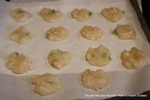 After the pears and sugar with some sliced citron has been boyled up to a marmelett for the receipt (recipe) Marmelett of popling-pare, lay some in little cakes. Pictured are some of the little cakes before they candy with the green pieces showing the citron.