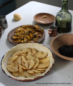 After the slices of pumpkin have been fried until enough for the receipt (recipe) To make a Pompion Pye on the bottom paste (pastry) lay in the bottom some sharp apples.