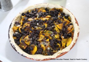 After the apples and fried herbed pumpkin have been added to the pie for the receipt (recipe) To make a Pompion Pye add Butter, Raisins, Currans, Sugar and Sack.  Currans are currants.