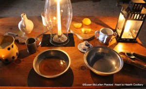 All the ingredients for this 1674 receipt (recipe) To make a very fine Sillabub are pictured with the exception of the sugar to sweeten.  The cream is in the yellow pitcher, the sack already measured and in the pewter bowl with a branch of Rosemary, and the lemon is ready to juice.