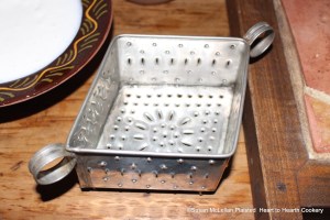 The Pennsylvania German word for the receipt (recipe) Egg Cheese is Oya Kase.  The typical mold used was a heart shaped punched tin so additional whey would drain.  The punched tin mold in my collection is in the shape of a diamond.