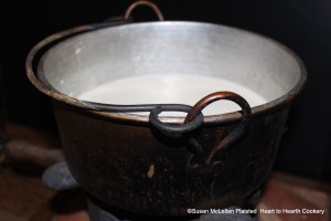 The first step in preparing the Pennsylvania German receipt (recipe) for Egg Cheese is to heat milk until it boils.