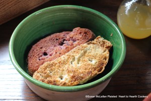After slices of Manchet  have been toasted with a toasting fork for the receipt (recipe) To dress Eggs in the Spanish fashion they are soaked in Claret.