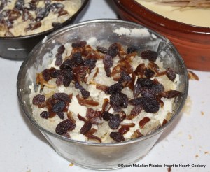 Continue to lay a layer of bread alternating with raisins and dates for the receipt (recipe) To make a White Pot until the Dish is full.  Between each layer grate nutmeg.