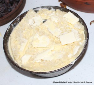 After the last layer of sliced dates and raisins for the receipt (recipe) To make a White Pot then put in your Cream, and lay slices of bread and bits of Butter on top of all.