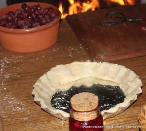 After all the ingredients are mixed for the receipt (recipe) A Goose Bery Pudding, put peast about the brim of the dish. Peast is paste and what is known as pie crust today. It was common in the 18th century to just have pie crust on the edges of the tart pan or baking dish.