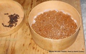 After the honey, grated bread, ginger, long pepper and sanders has been thoroughly mixed by hand for the receipt (recipe) To make gingerbrede, put in a flatt boyste & strawe eron suger.  Before I put the mixture in my box, I lined it with paper and then strewed on sugar.