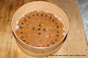 After the receipt (recipe) To make gingerbrede is boxed and strewed with sugar pick erin clowes rounde aboute be e egge and in e mydes yf it.  As per the directions I stuck in whole cloves about the edge and in the middle of the gingerbread.  