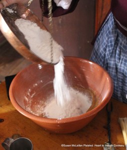After the ginger and nutmeg have been added to the mixture of butter, sugar, treacle and cream for the receipt (recipe) To make Ginger-Bread Cakes, take three pounds of flour ... and make up the Bread stiff.  I made one-third of the receipt and weighed out one pound of flour on my balance scales.