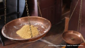 The receipt (recipe) To make Ginger-Bread Cakes calls for two ounces of Ginger beat fine as pictured on my balance scales.  Since I prepared one third the receipt using one pound and not three of flour, I added one third the ginger.  