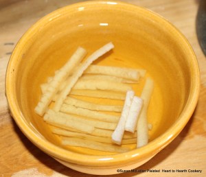 For the receipt (recipe) To make the Orange pudding the first step is to take the Rind of a small Orange.  Since this is not Seville orange season for this 1654 receipt, I am using my preserved Seville orange peel.  The peel is soaking in water till it be very tender.