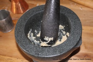 After the rind of a Seville orange has been soaked till it is very tender for the receipt (recipe) To make the Orange pudding beat it very fine in a morter.