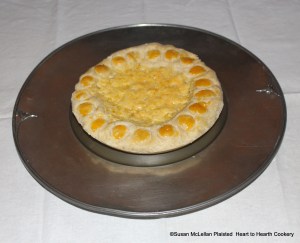 The receipt (recipe) To make the Orange pudding presented to table: Take the rind of a small Orange, paired very thin, and boiled in several waters till it be very tender, then beat it very fine in a morter, then put to it four ounces of fine sugar, four ounces of fresh butter, the yolks of six eggs and a spoonful or two of cream, with a very little salt, beat all these together in a morter, while the oven heats then bake it in puff-paste. Hannah Wolley, 1654.