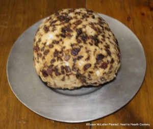 Pictured is half the receipt plated of H. Glasse's 1747 A Boiled Plumb-Pudding. Take a pound of Suet, cut in little Pieces, not too fine, a Pound of Currants, and a Pound of Raisins stoned, eight Eggs, half the Whites, the Crumb of a Penny-loaf grated, and a Tea Spoonful of Salt, half a Nutmeg grated, and a Tea Spoonful of beaten Ginger, a Pound of Flour, a Pint of Milk. The full receipt would boil for five hours in a pudding bag. The half receipt boiled for three hours.