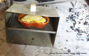 After the egg yolk decorated crust has been laid on the rhubarb for the receipt (recipe),written in a letter dated 22 September 1739 written by Peter Collinson to John Bartram of Philadelphia, the rhubarb tart was baked in a tin baker.