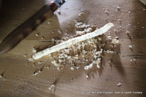 After an equal amount of Manchet is grated to equal the quantity of the half pound of grated Parmesan cheese for the receipt (recipe) A made dish of Parmizant, a horseradish is pared.
