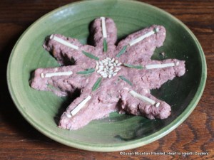 After the claret wine is added just to moisten the mixture of grated Parmesan cheese, grated bread, minced tarragon and horseradish for the receipt (recipe) A made dish of Parmizant dish from the middle to the brim, in parcels as broad as your knife; garnish it with Carraway Comfits, Horse-radish and Tarragon.