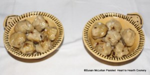 After the plum pudding balls have been boiled for half an hour for the receipt (recipe) To make little plum puddings: My Lady How's Receipt serve them with buter and suger and a little rose water and vinegar.