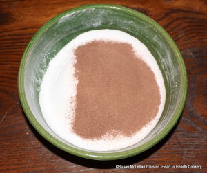 After the chocolate cake from my metate has been grated for the receipt (recipe) Chocolate Puffs mix them together with the half a pound of double-refined sugar that has been beaten and sifted fine.