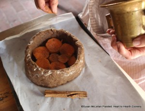 After slices of Spanish potatoes as thick as your thumb have been put over the bottom of the coffin for the receipt (recipe) To make a Potato Pye and seasoned with nutmeg, season them with Cinamon.  True cinnamon, Ceylon cinnamon was used.