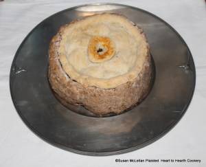 When the coffin with the receipt (recipe) To make a Potato Pye was removed from the bake oven, a wonderful aroma filled the air.  The ingredients were Spanish Potatoes (sweet potatos), nutmeg, cinnamon, ginger, sugar, marrow, raisins, dates, Oranado (candied orange peel), and Cittern (candied American citron melon).  The baking case (coffin) is made using coarse whole grain flour made with a hot water paste and coffin former.  The lid is made of fine cold water paste.