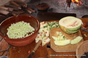 After the rind has been cut off the citron melon for the receipt (recipe) The American Citron Melon cut it into small pieces. It is a time consuming process as the rind is dense but very important for the outcome of the process.