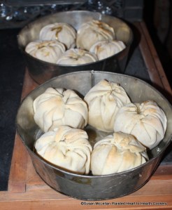 When you can see and smell that the receipt (recipe) Snow-balls is ready to come out of the oven place the tin pans on a surface that will not be harmed by the heat and be prepared for the next step that needs to be done quickly.
