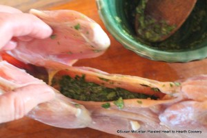 After the whisked egg and parsley chopped fine have been mixed together for the receipt (recipe) To Roast a Rabbit fill the belly of the rabbit with the mixture.