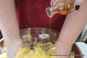 After the batter for the receipt (recipe) Nun's Cake has been beaten for two hours put in a little tincture of saffron to colour it. Saffron is the brillian orange-yellow hand-picked stigmas from the Crocus sativus flower. The tincture was made by adding several stigmas to a small amount of alcohol.